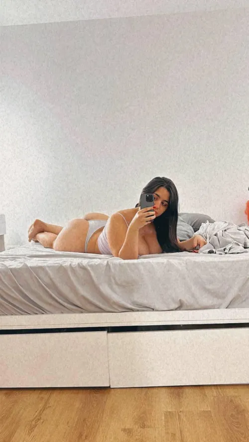 Bored and alone in my bed, waiting for you