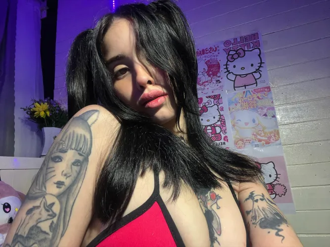 Tatted, stacked, and dressed to tempt your darkest thoughts.