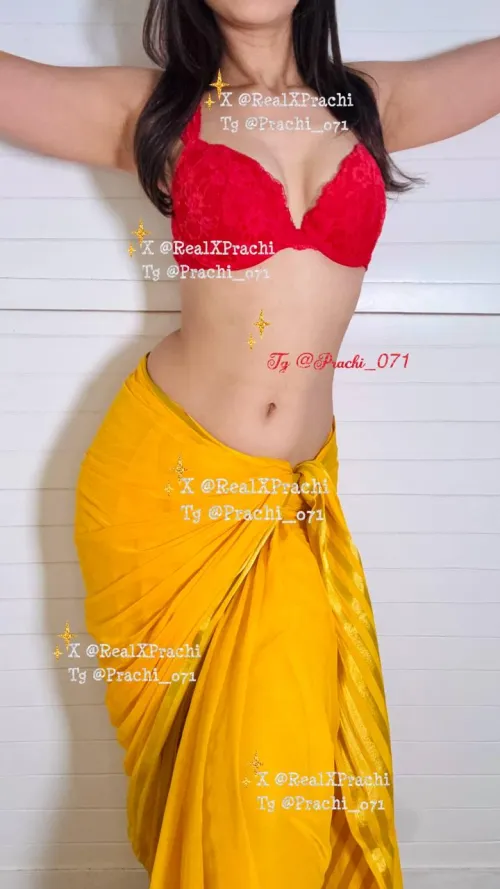 Golden pleats, scarlet tease… What if I said this is just the beginning? 💫