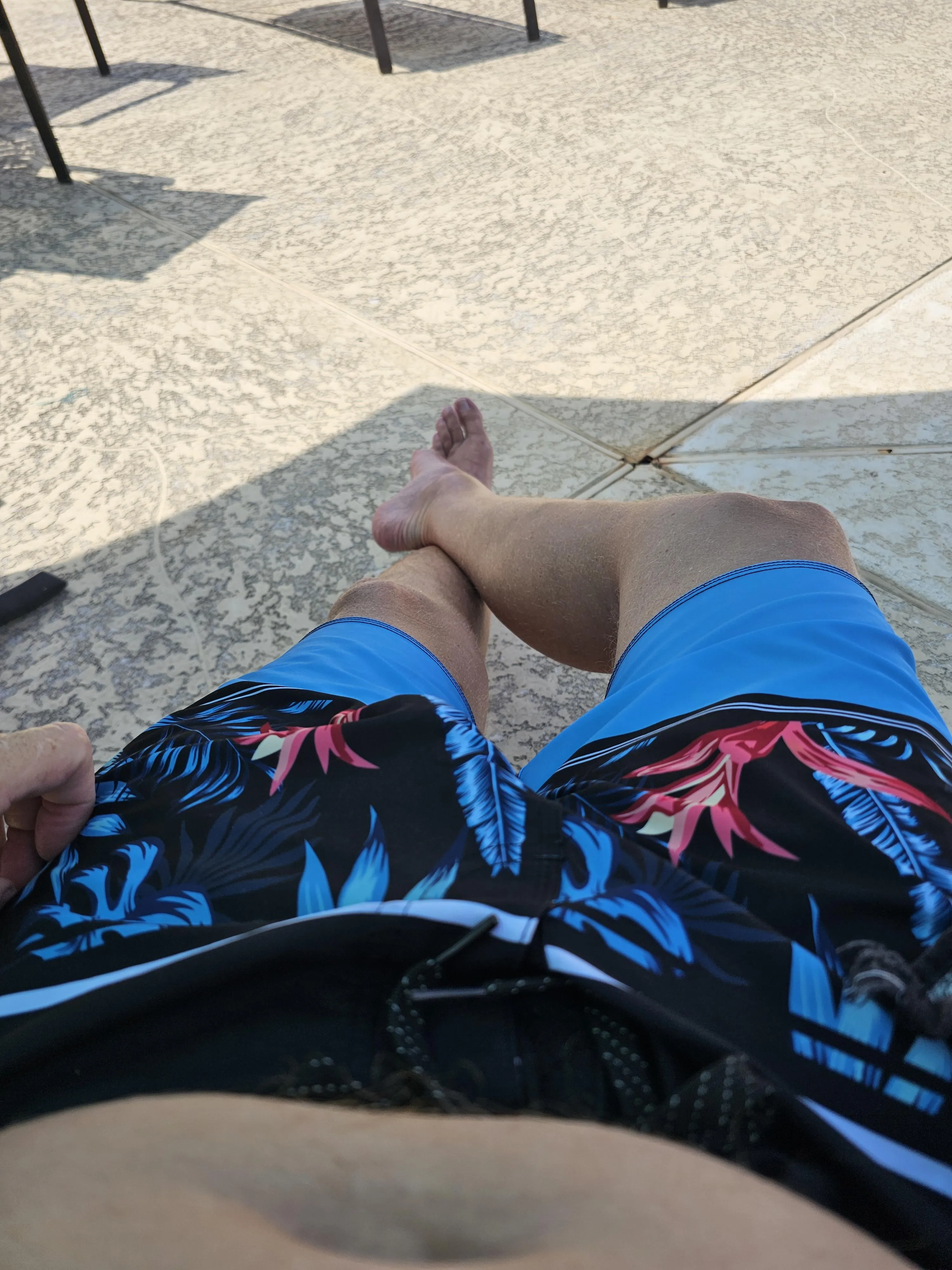 At empty public pool, except for the life guard