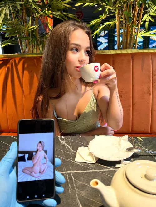 He's teasing me with my photo again, the sly one