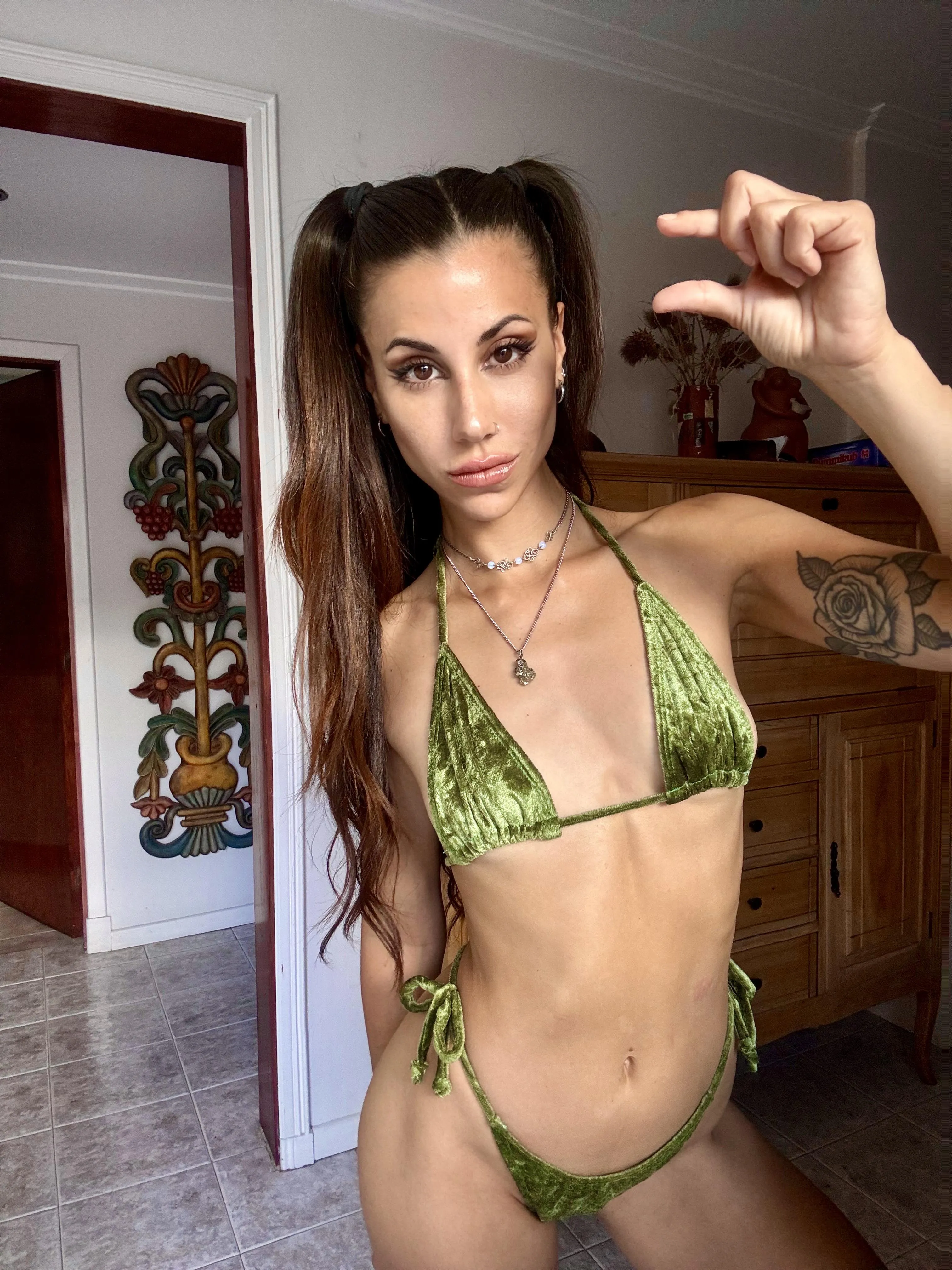 Your goddess is scared of that shrimp. Get on your knees, dog