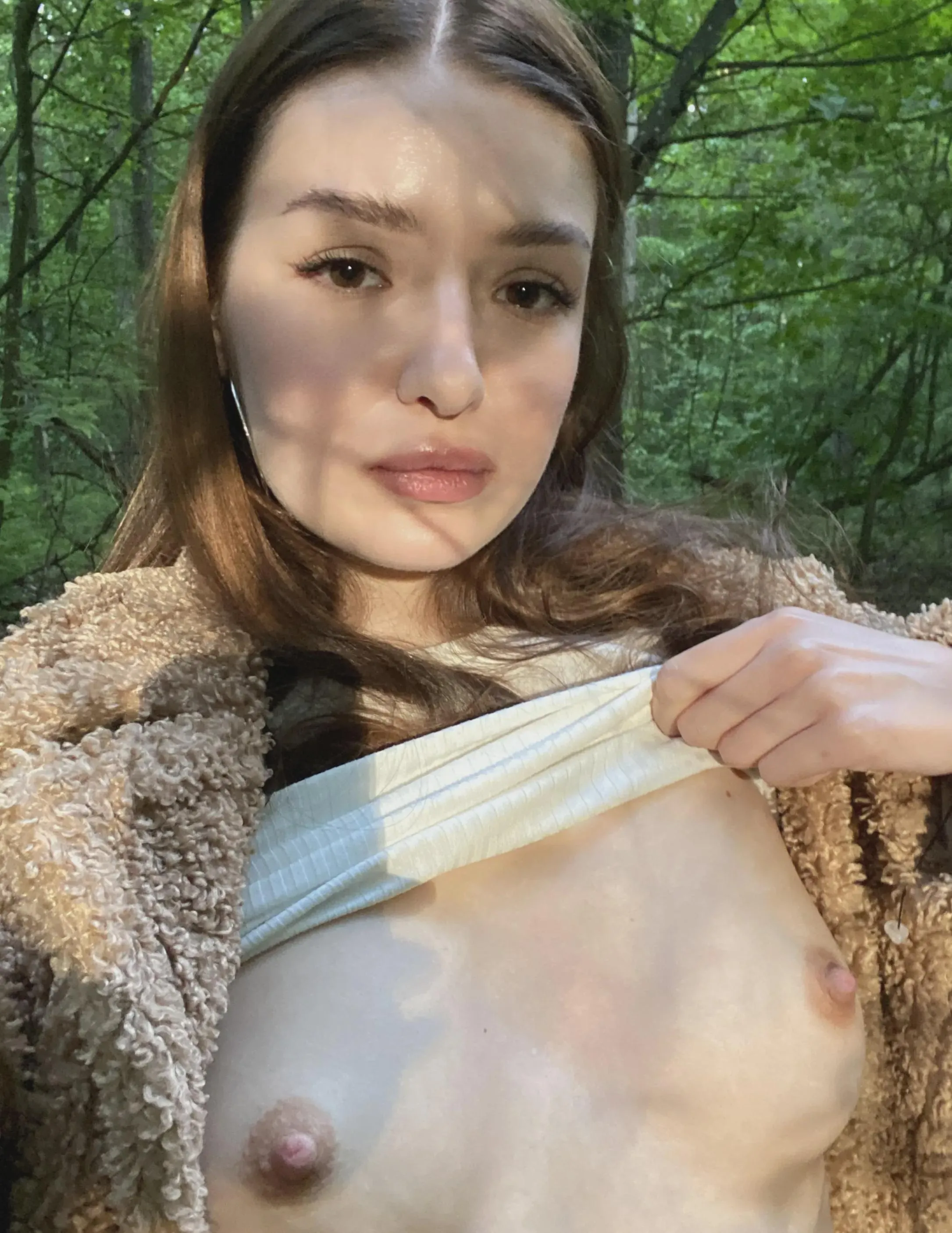 Im taking selfies of my bare chest in the woods