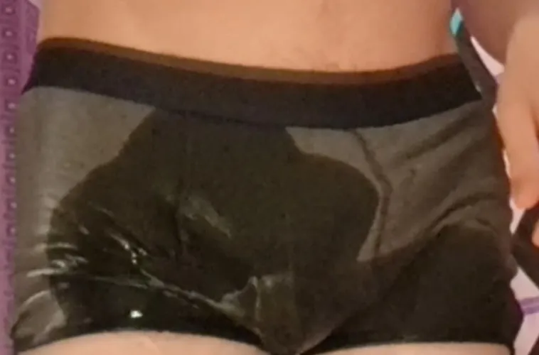 wetting in dark grey underpants