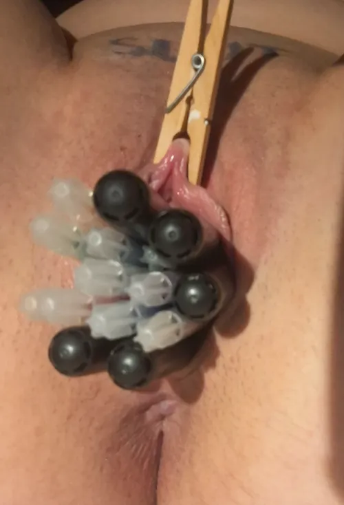 filled over my limit and clit clamped. it hurts so much