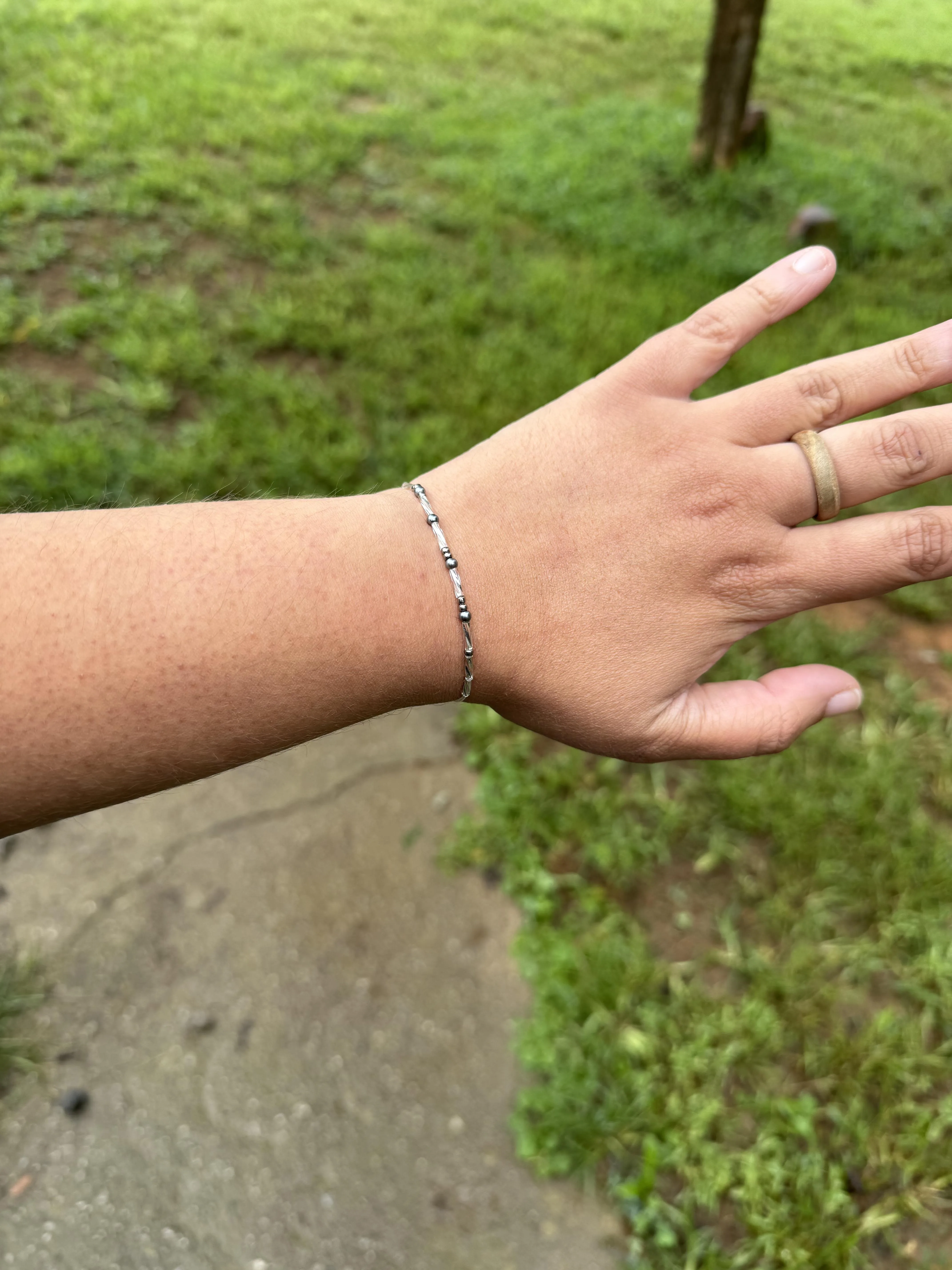 Handmade discrete Morse code bracelet that reads DADDY