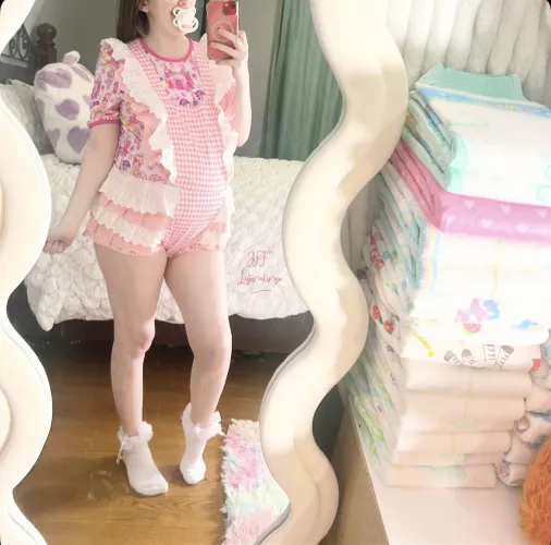 My new ruffle romper with my onesie.🍼