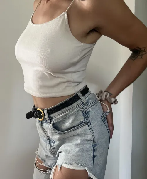 A little midriff and a little thigh