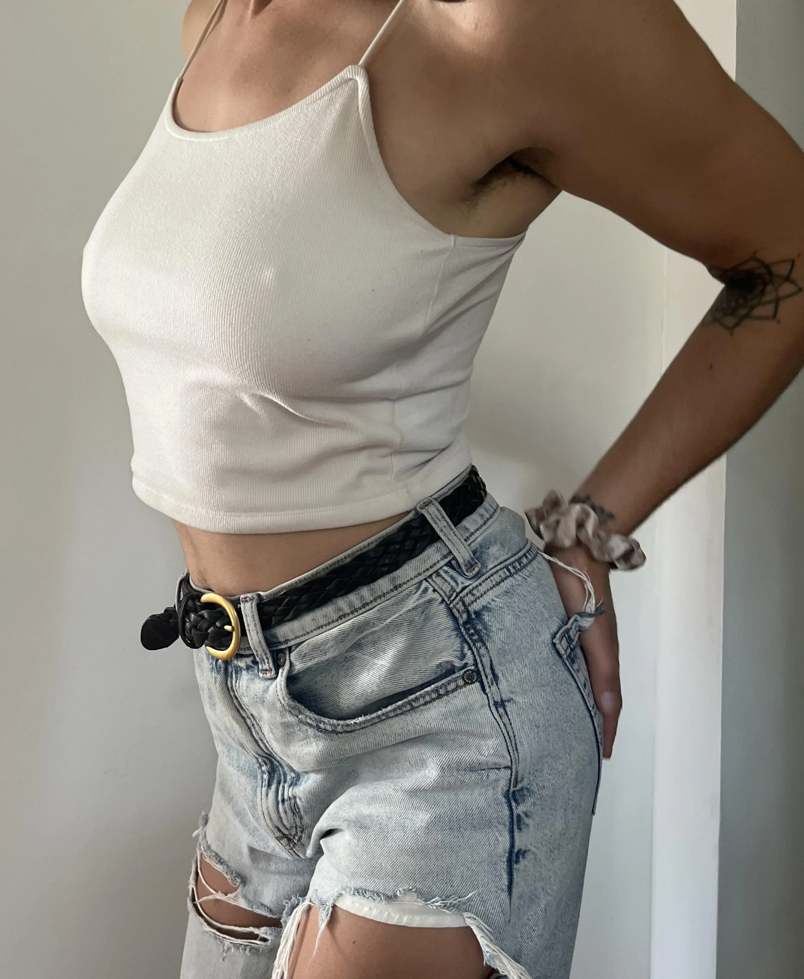 A little midriff and a little thigh