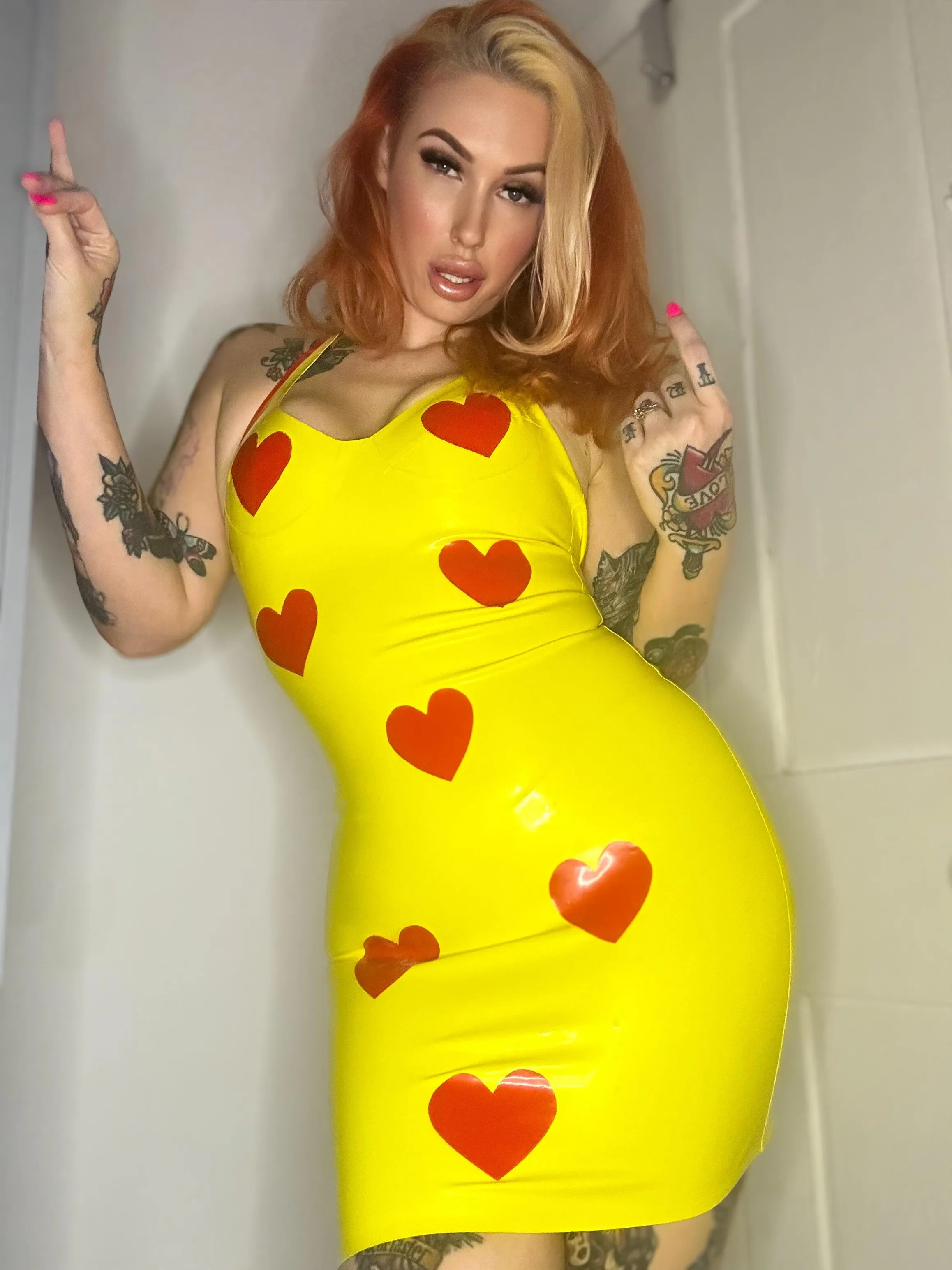 Yellow, shiny, and impossible to resist… admit it, latex owns you.
