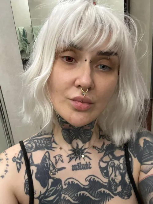 I like this picture bc you can really see my bust tats