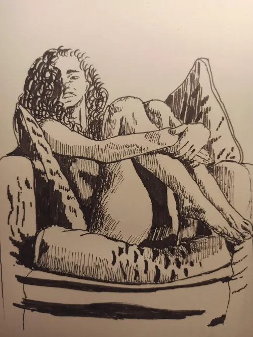 Curled up in a chair