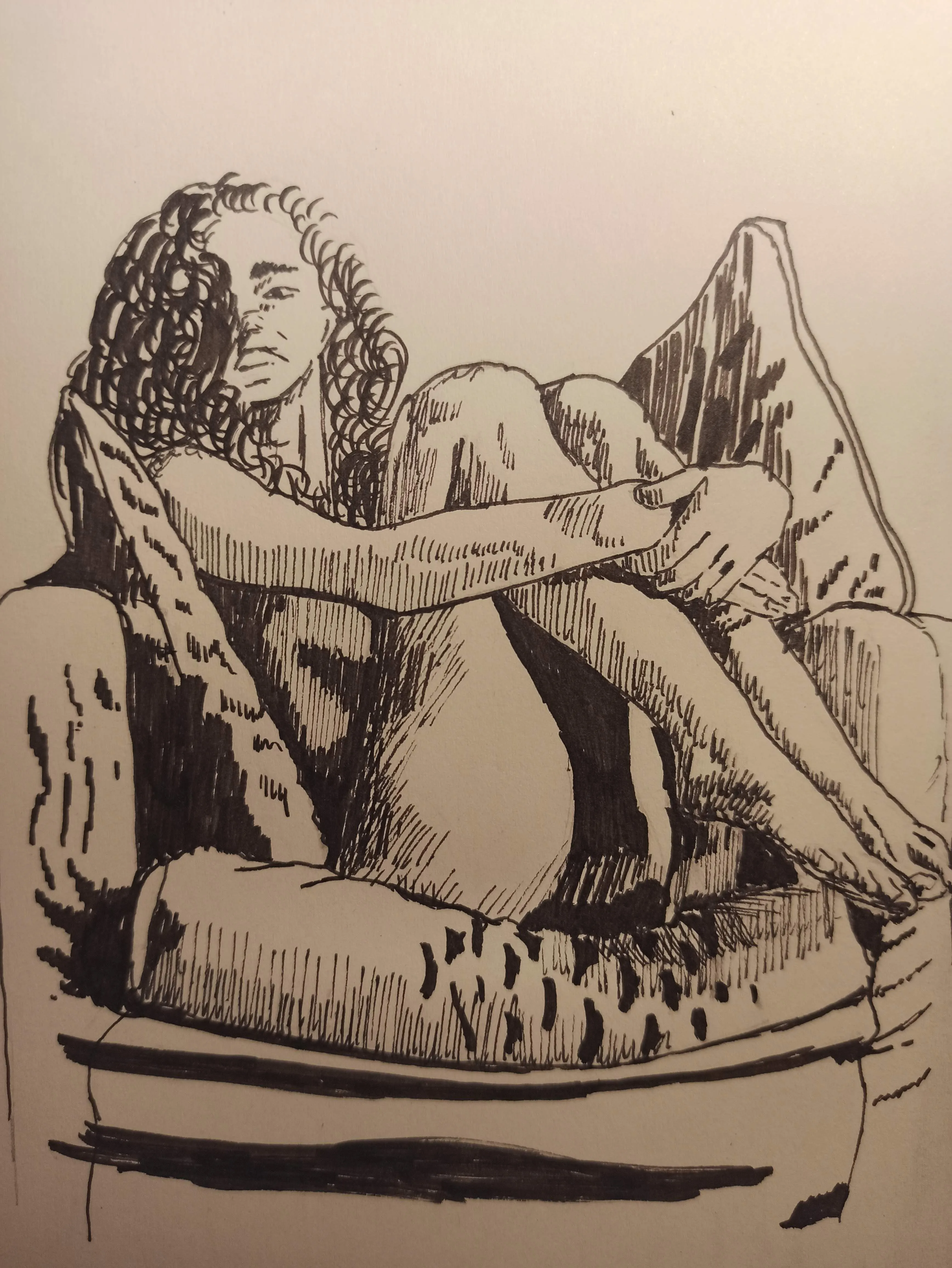 Curled up in a chair