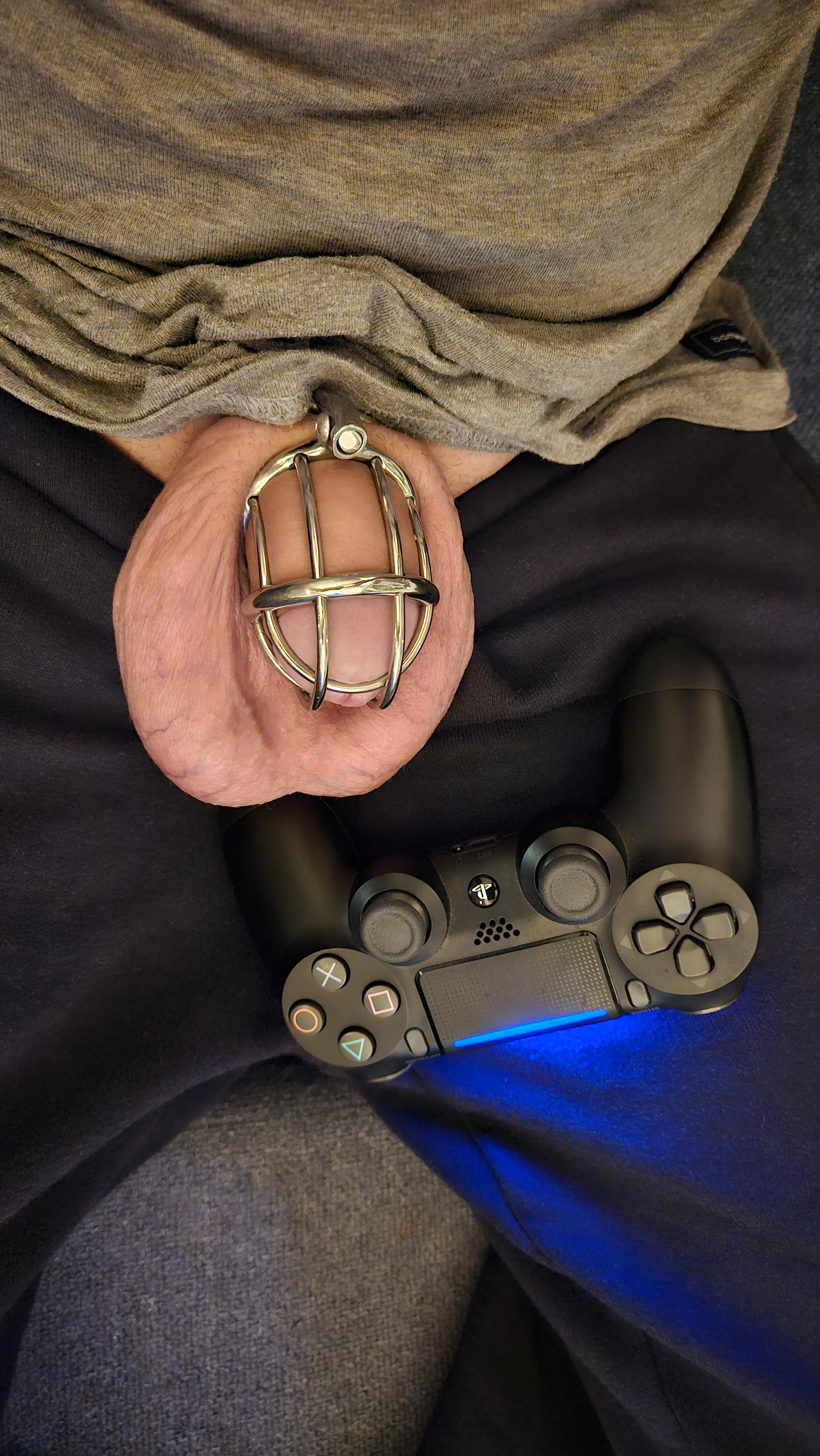 Playing with a locked cock