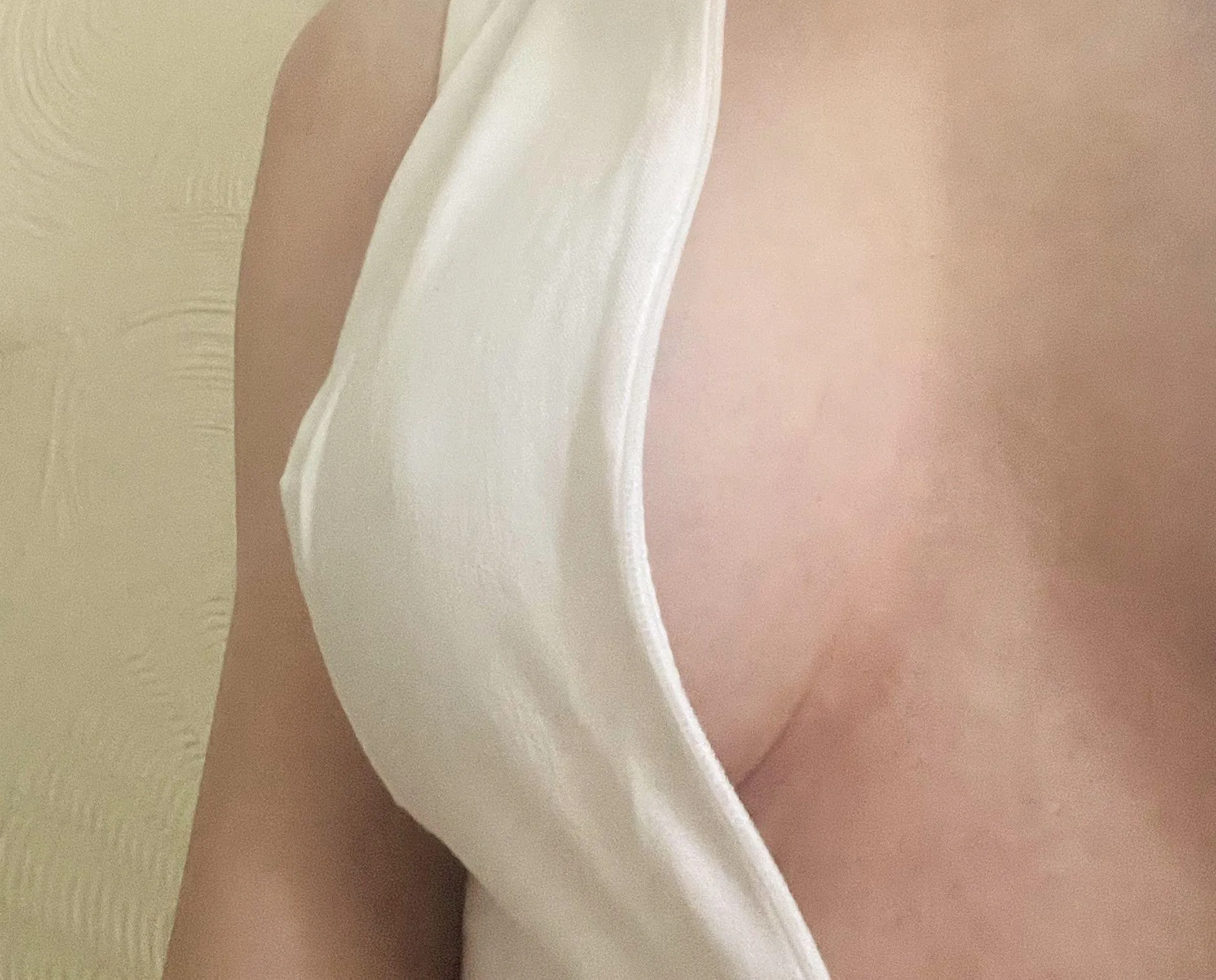 You can just see the hard nipple