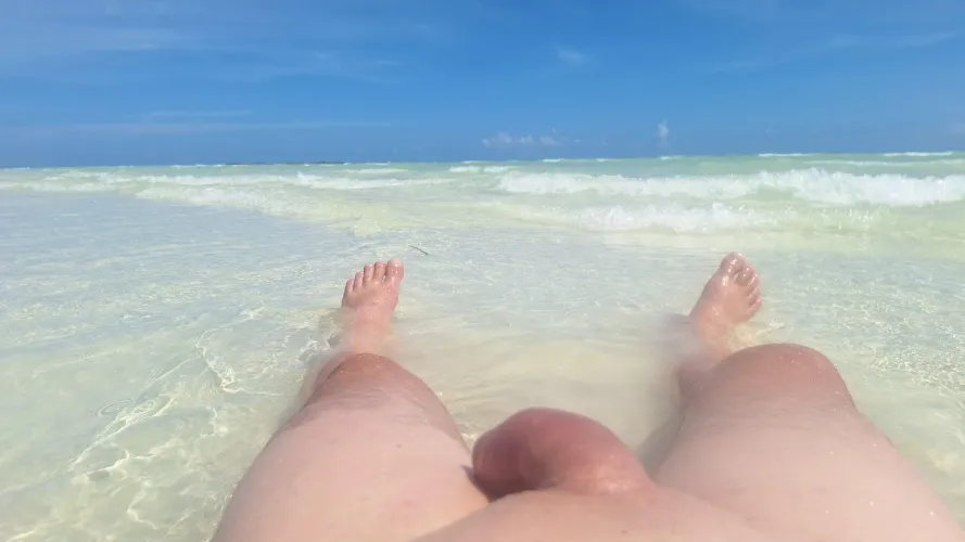 Nude and lounging on one of the world's most beautiful beaches