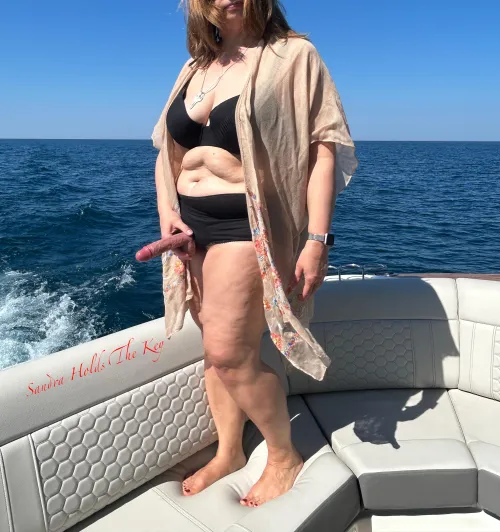 On our boat, I wield more than a key to his cage.