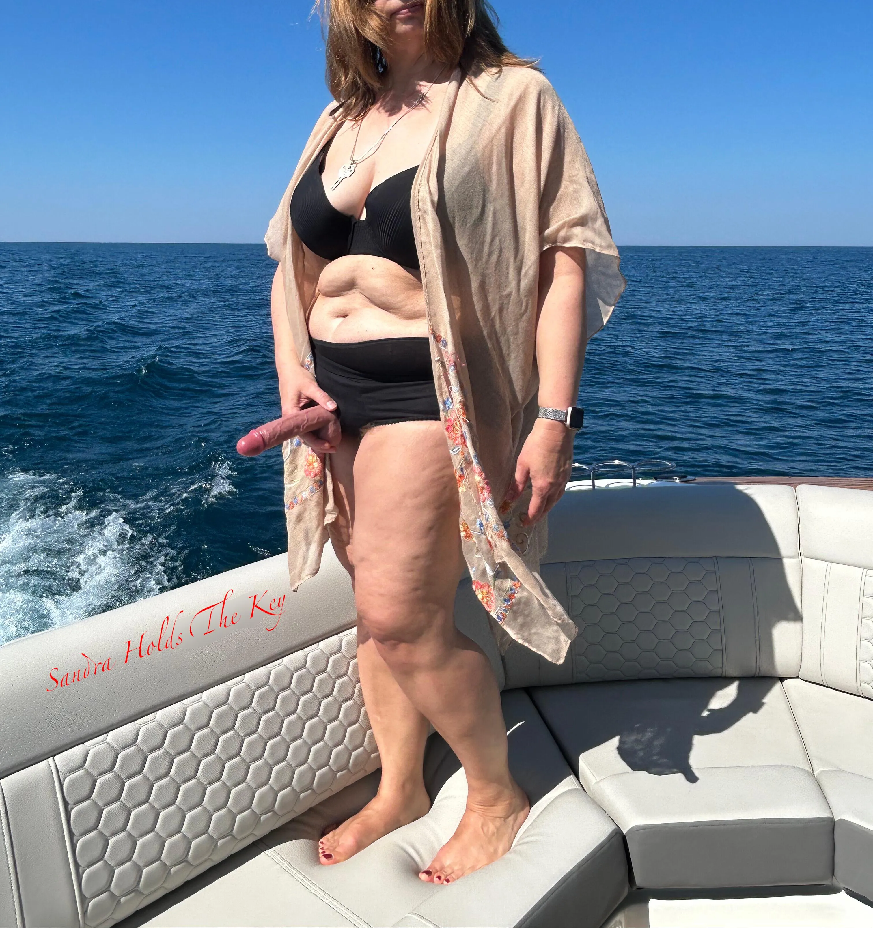 On our boat, I wield more than a key to his cage.