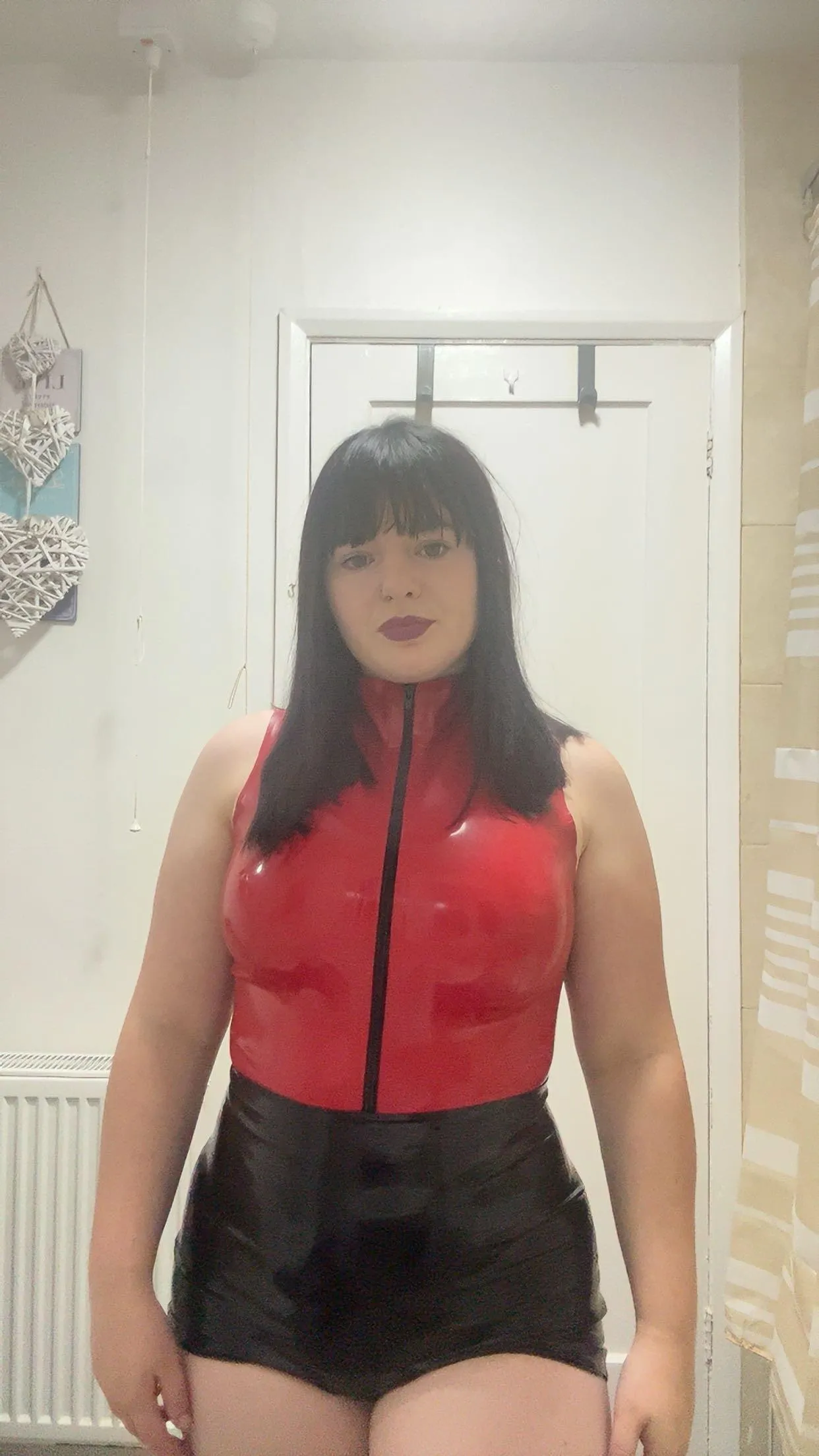 Latex bodysuit and latex shorts. 🖤 Is it missing anything?