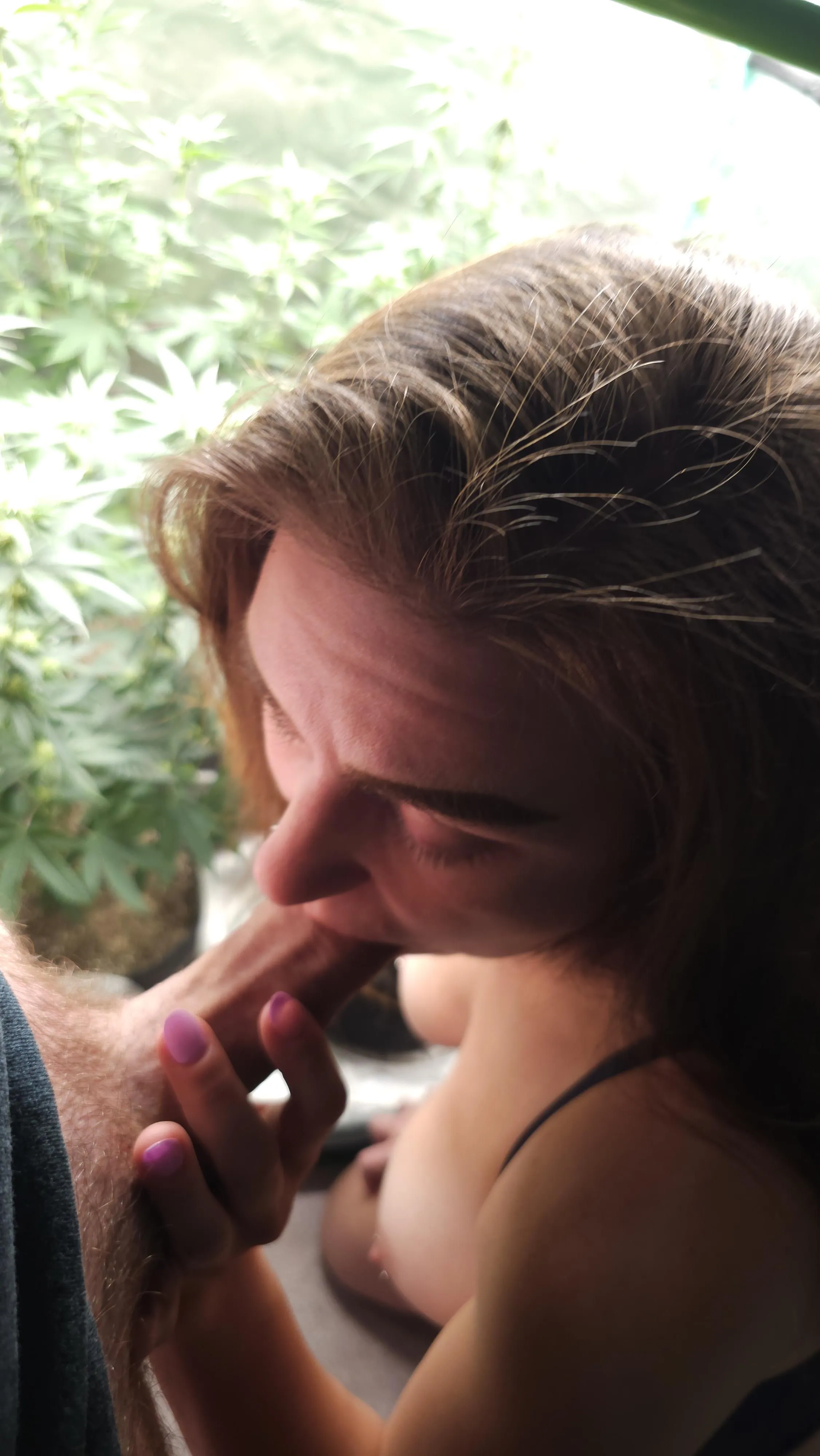 Swallowing cock in the garden