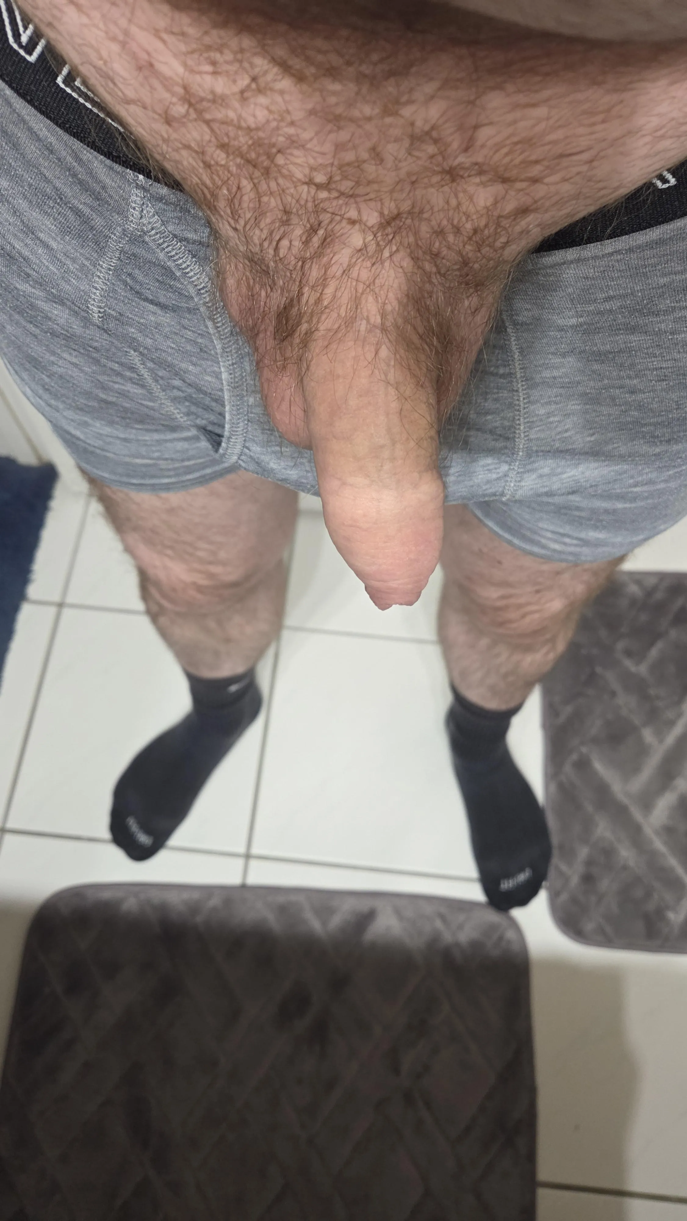 My semi hard, uncut cock in black Nike for you