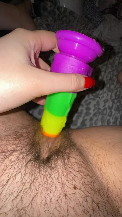 This curly-haired MILF is craving your candy