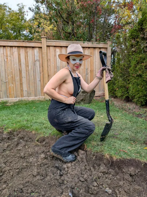 Doing a little gardening and showing off my side boob