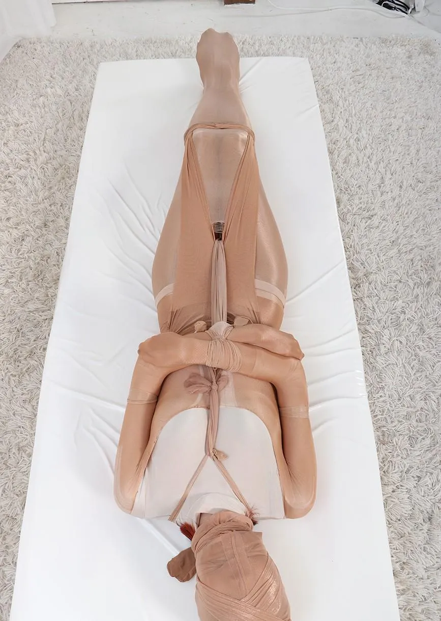 Sylvie's pantyhose encasement is my favorite.