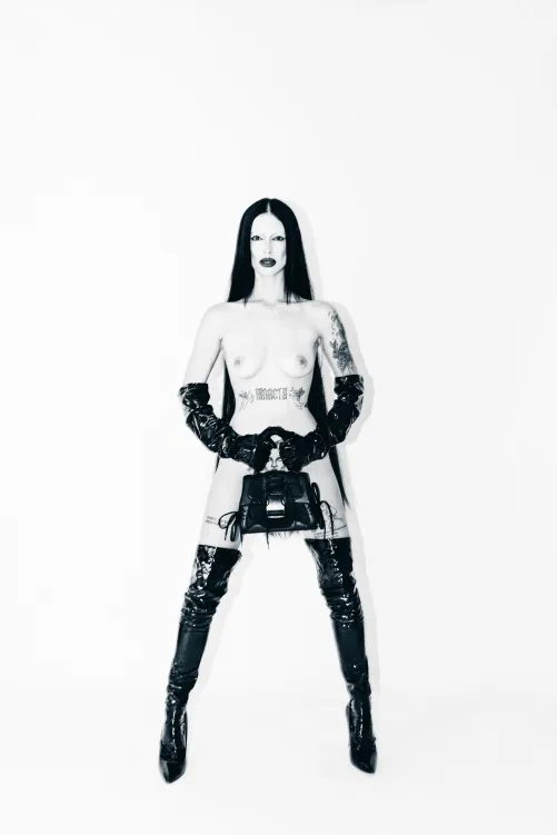 DarkMuseGlo with Steve Madden handbag...