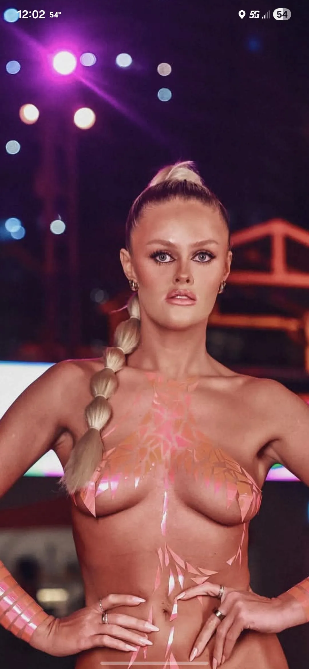 Like someone pinched zoomed her face inwards