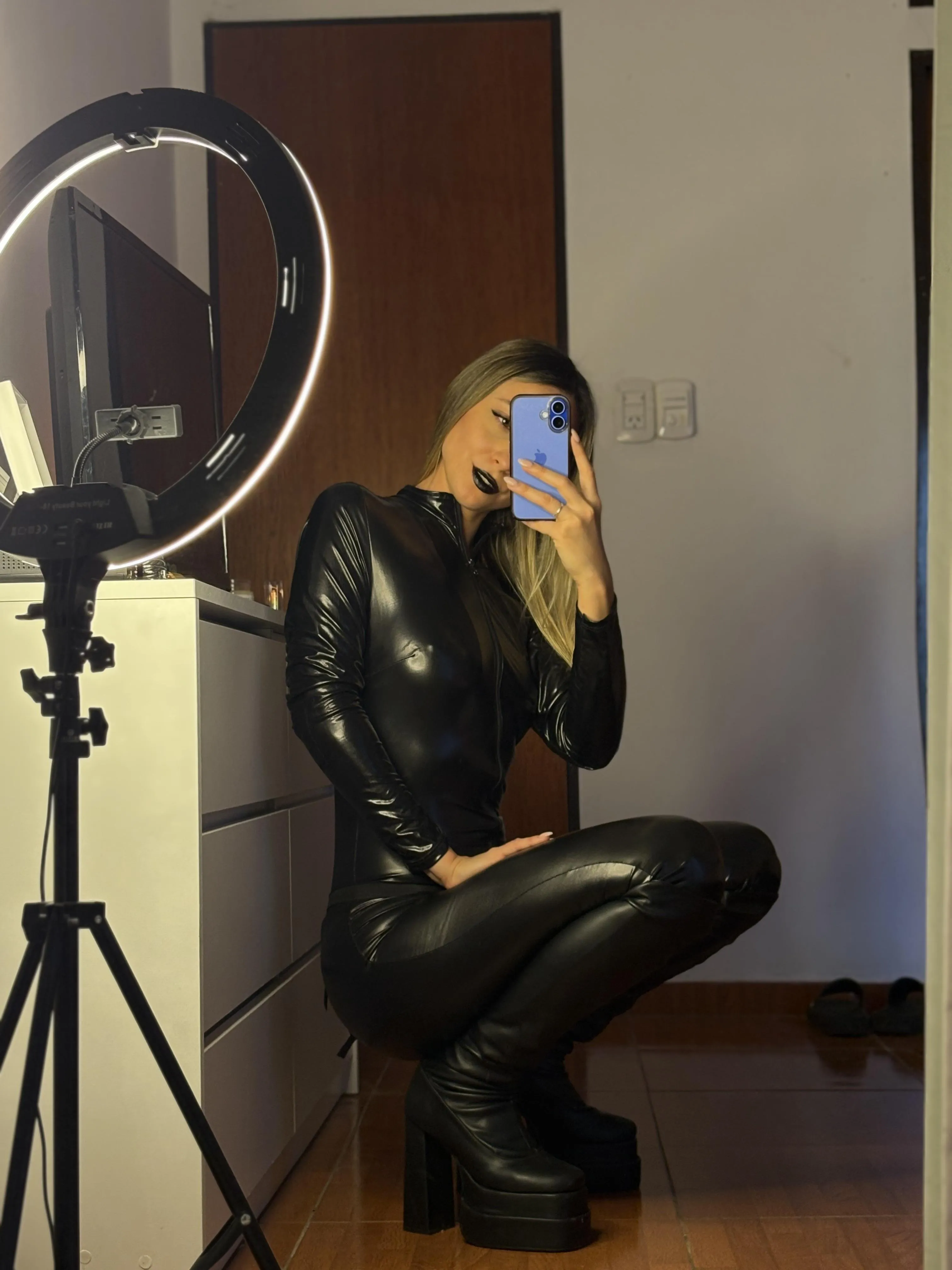 Do I look hot in this leather costume and boots?