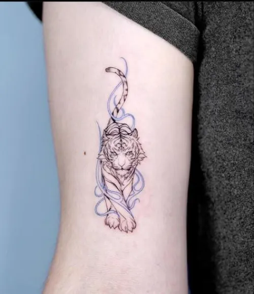 She has a tattoo of a TIGER like the image but hers was more on the outside of the upper arm - white brunette, 18-21yo - her room had wooden ceiling and a unique tiled wall behind her bed