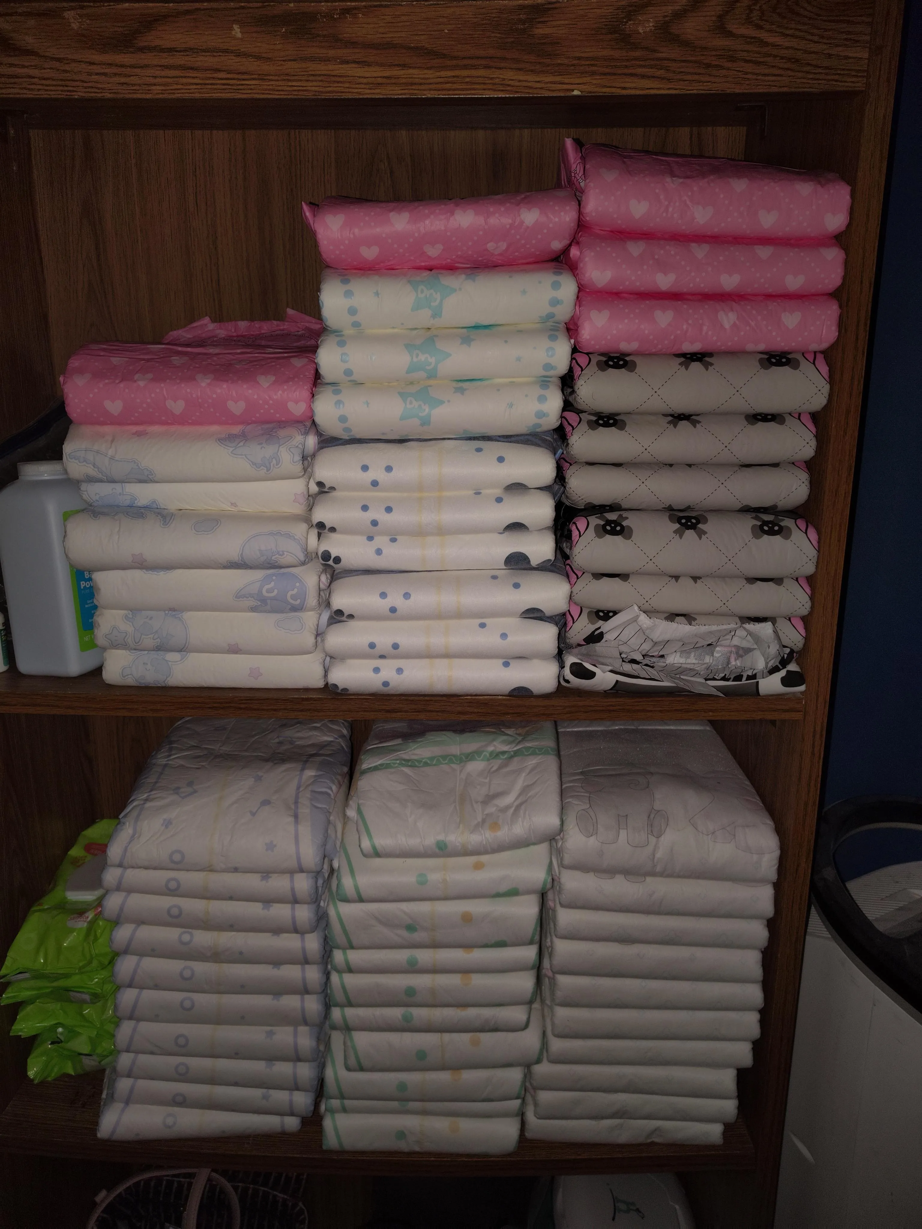 My current diaper stash 🍭🩷 will be ordering more this coming weekend (after I get paid)