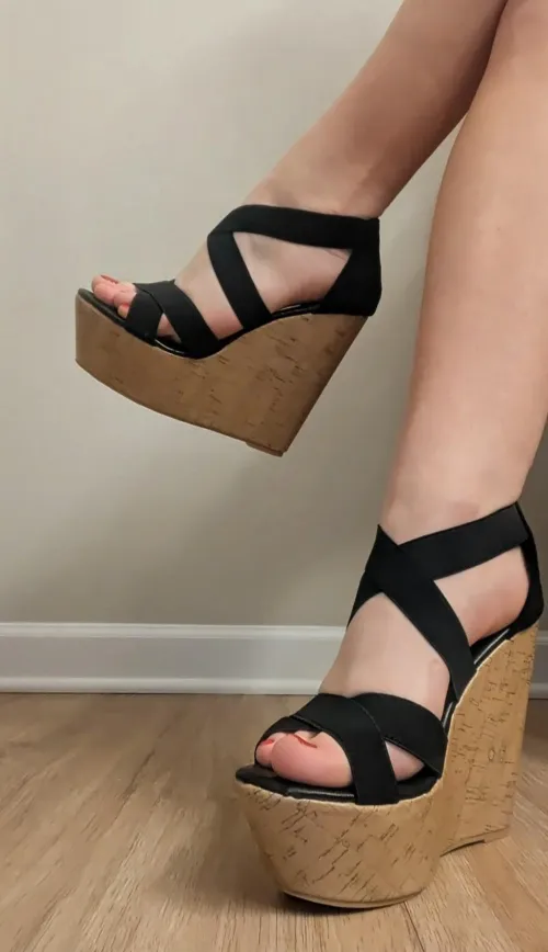 Cork wedges and bare legs