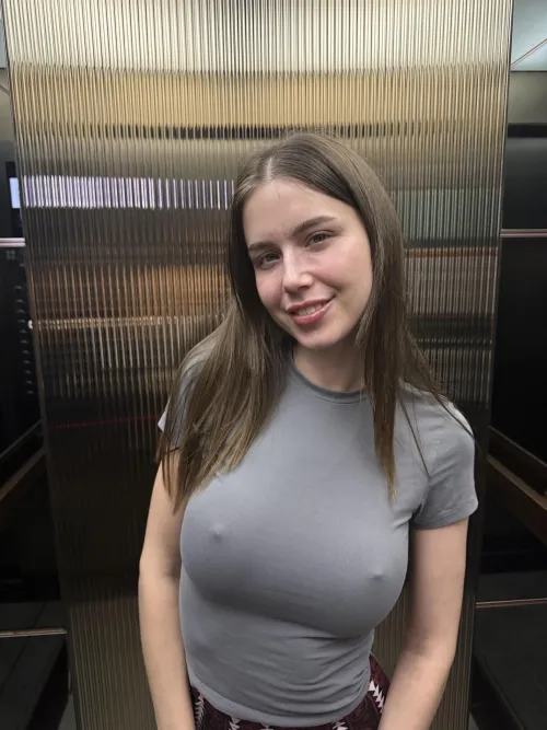 Braless in the elevator