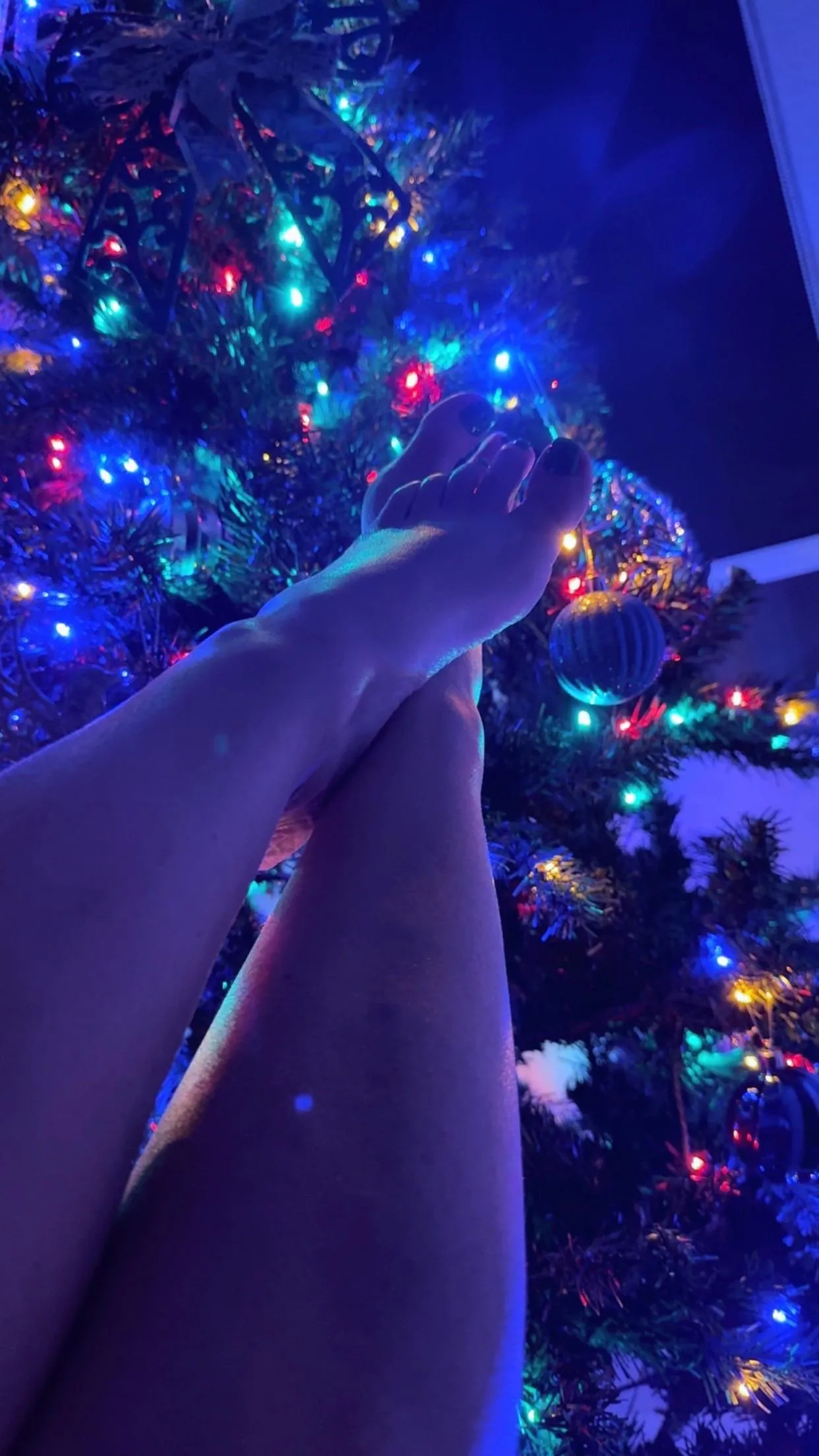 “Should I do a full Christmas photoset? 🎄😉”