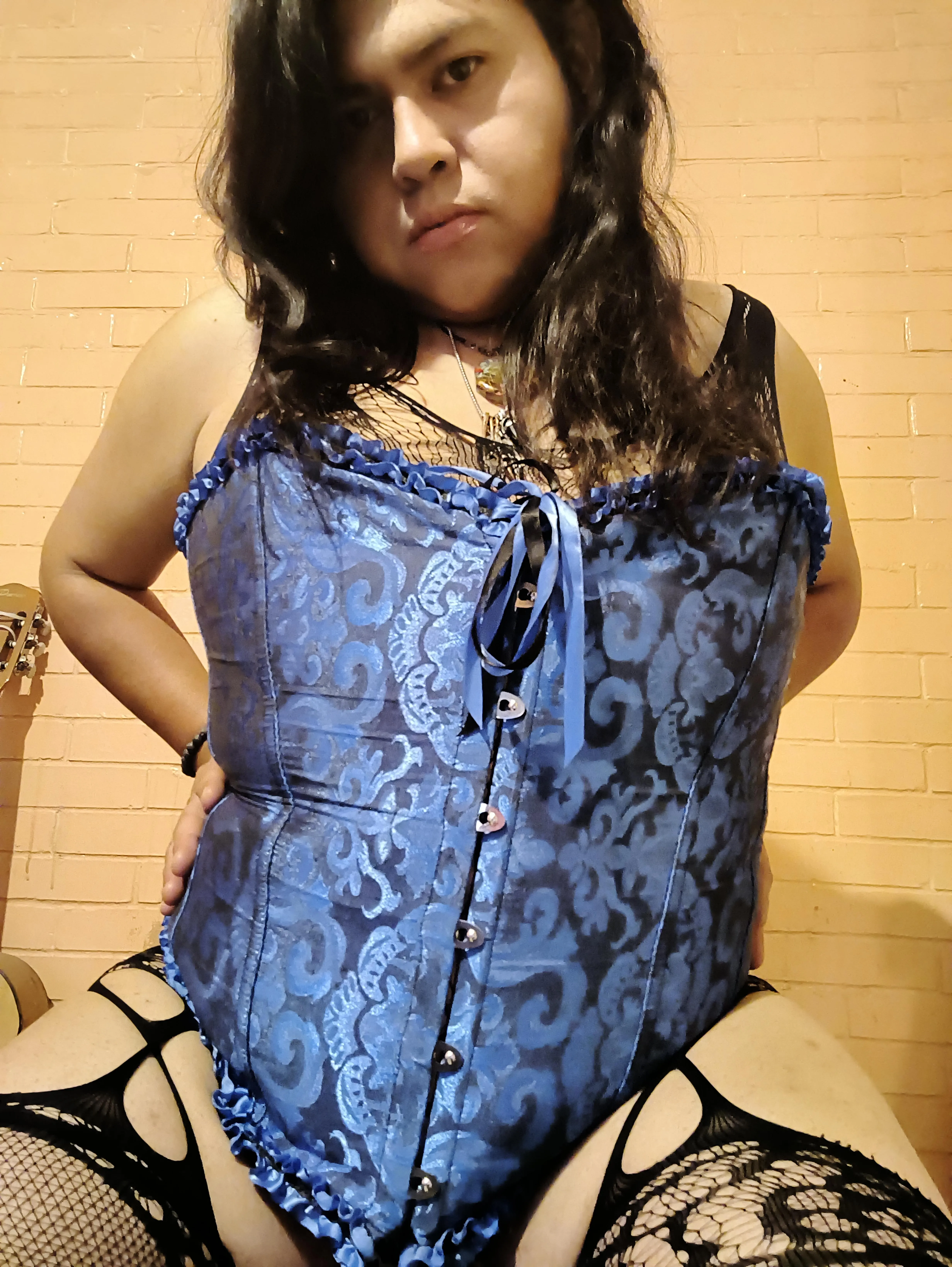 “Do you like my blue corset? It’s designed to be admired.