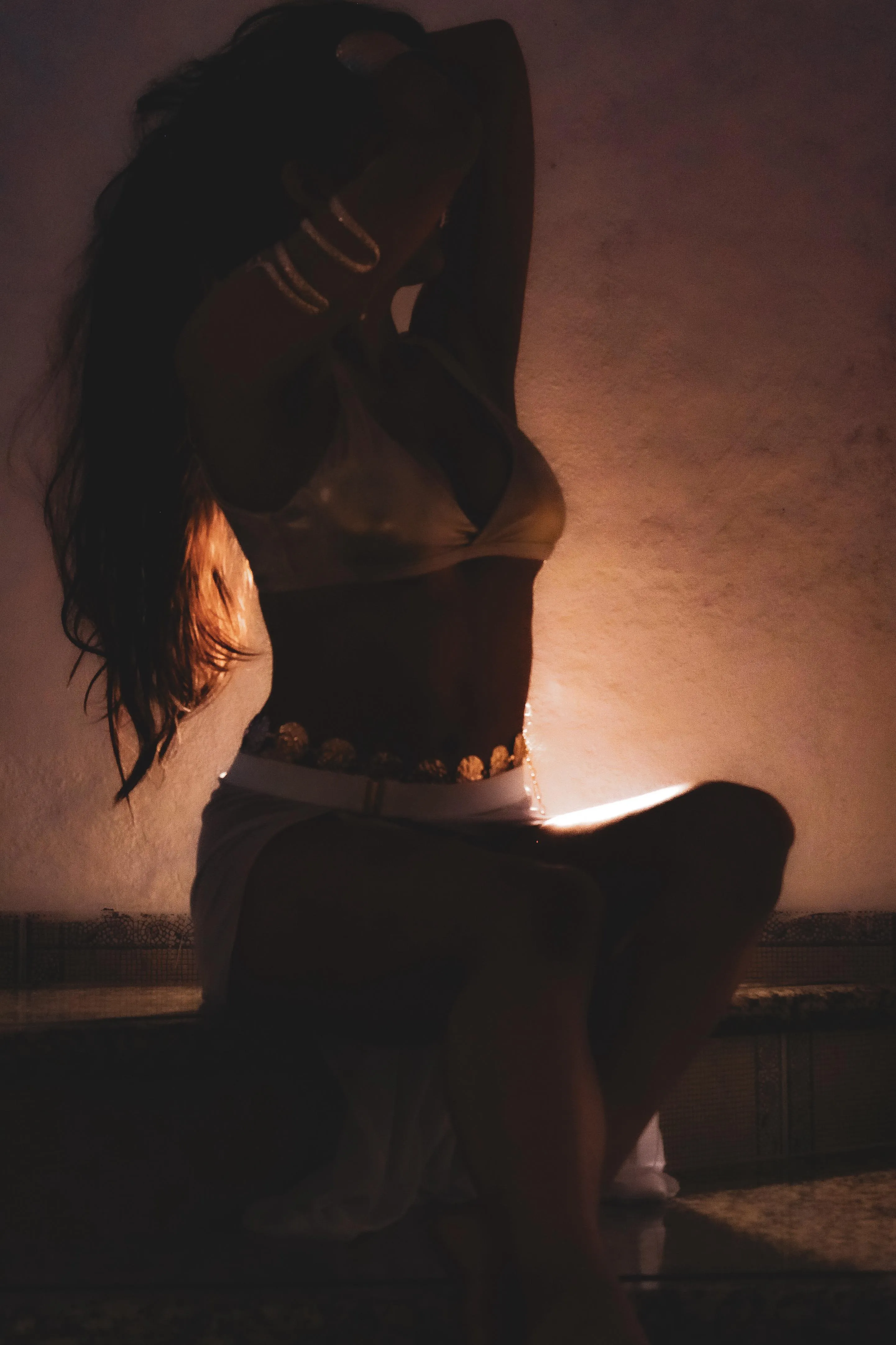 Long hair, slow movements… a fairytale rewritten in shadows.