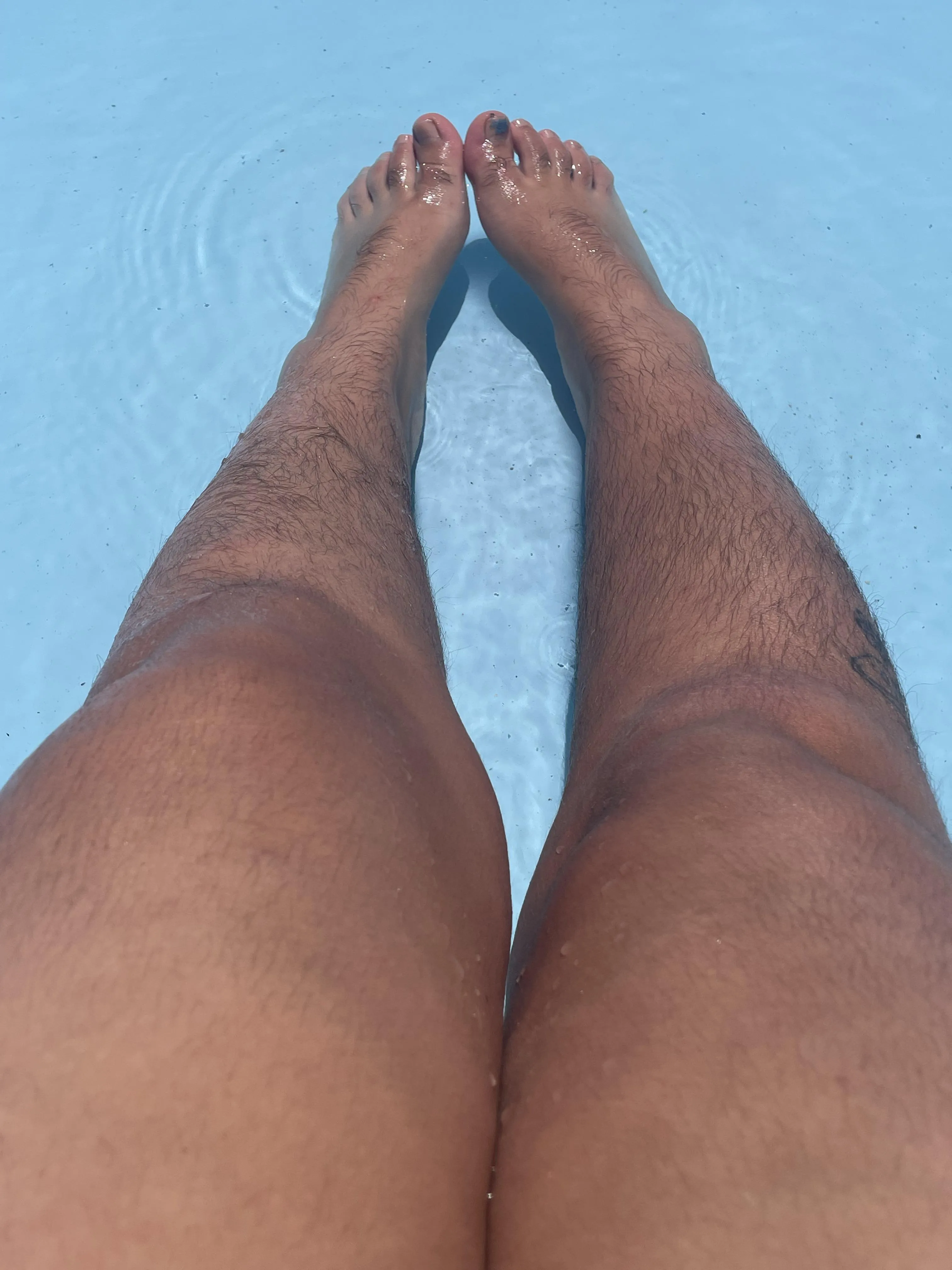 My hairy legs are so happy in the pool!