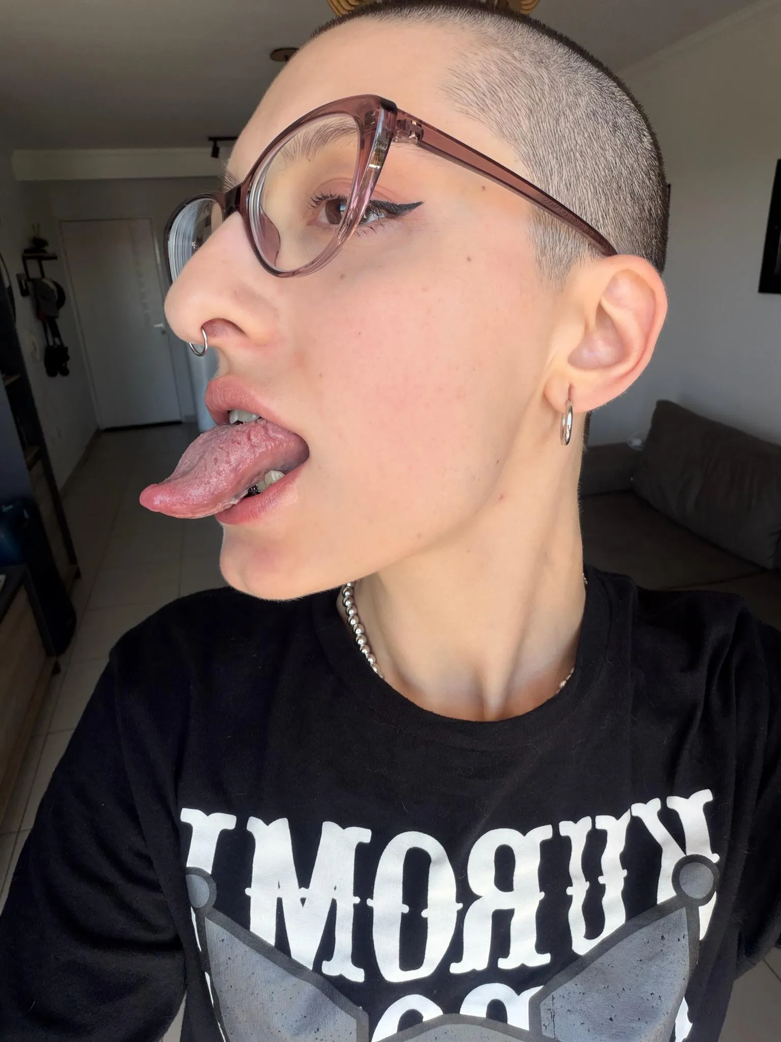 Side profile of my long tongue out, ready to tease and taste you.
