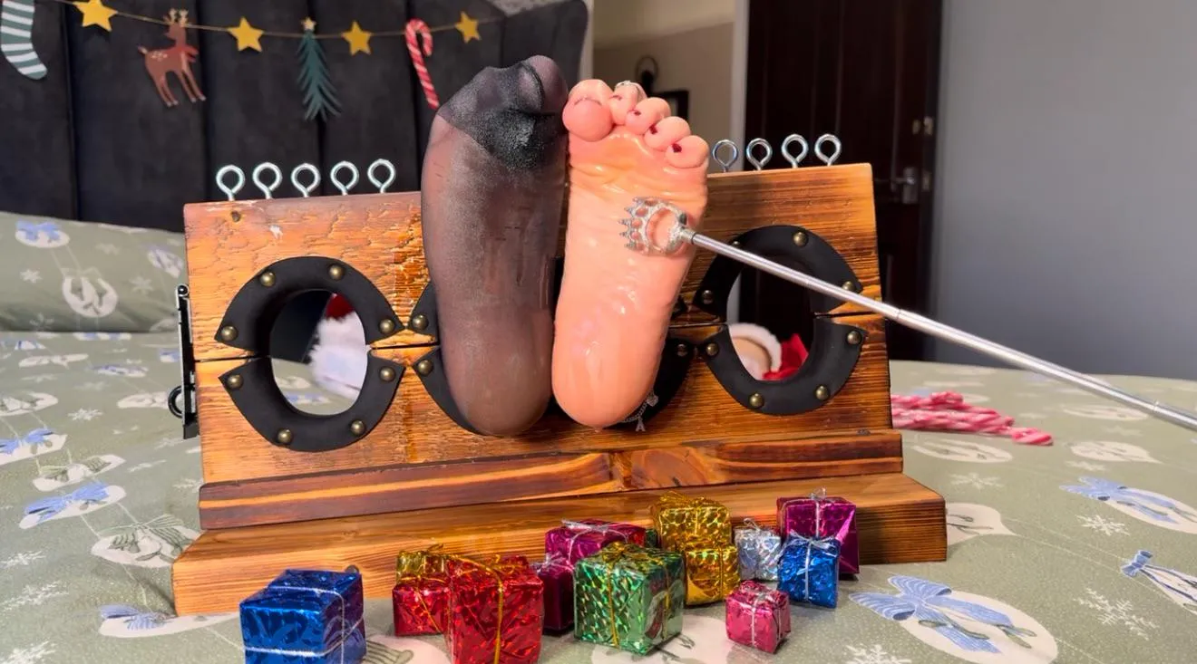 One pantyhose foot and one bare foot getting tickled silly before we drenched them in oil and cranked the sensitivity right up.