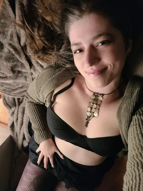Black Bra, green sweater