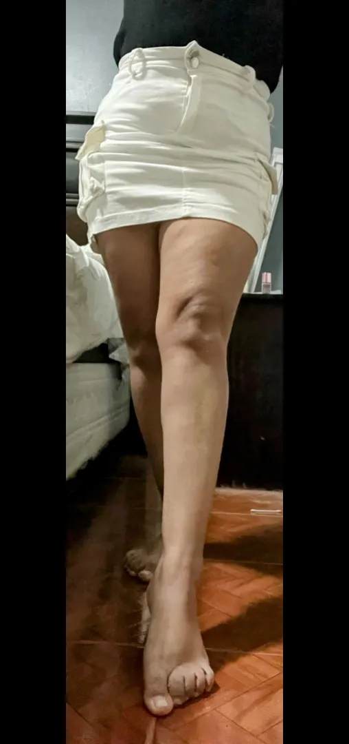 Barefeet latina in a miniskirt. Is there anything better