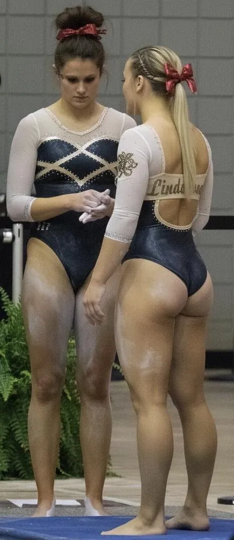 Gymnasts with red bows