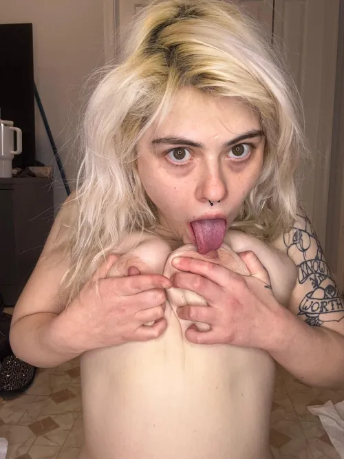 My queen sucking her own nipples drives me wild