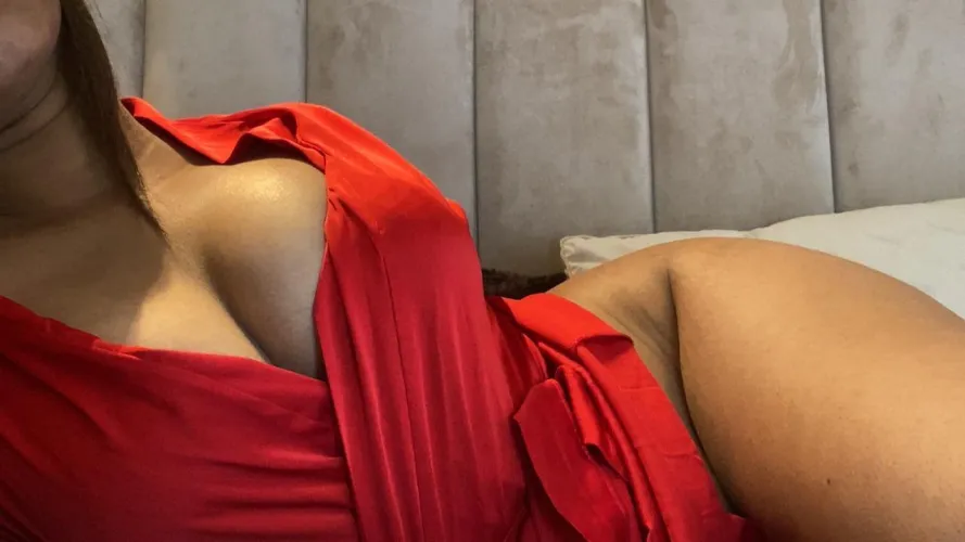 This red satin barely contains my natural curves