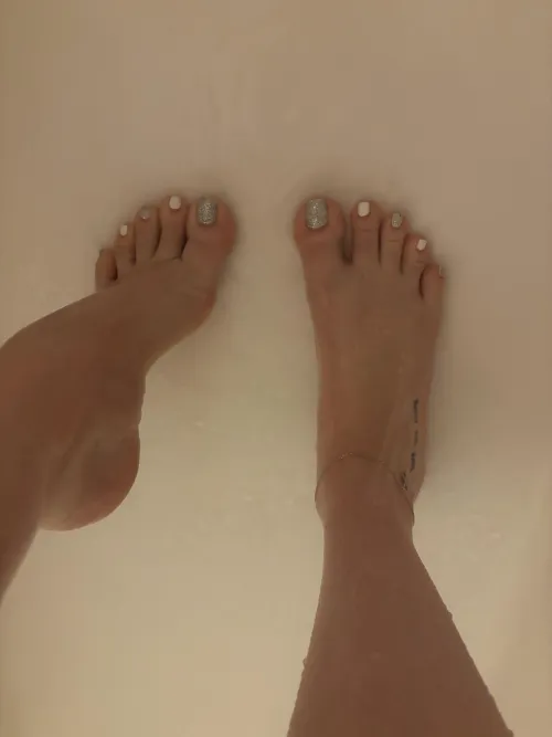 would my feet distract you from your shower?