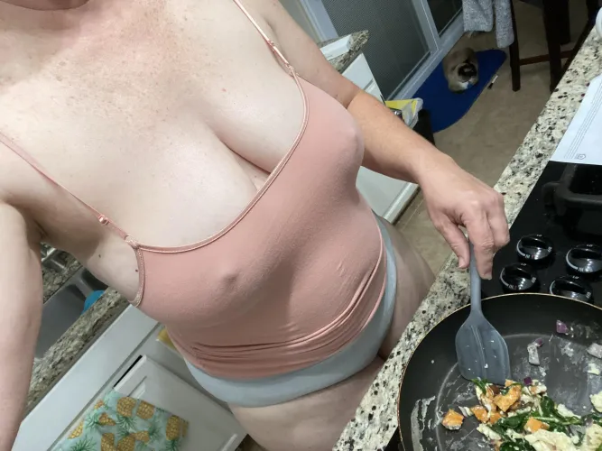 Braless selfie while doing meal prep.