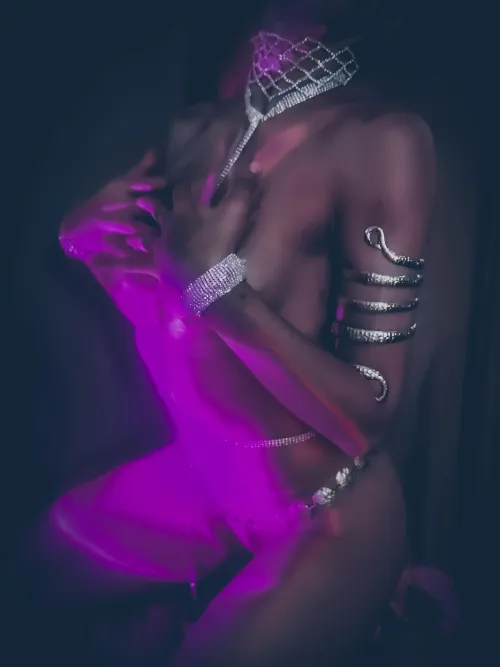 Neon light, slow breath, electric skin.