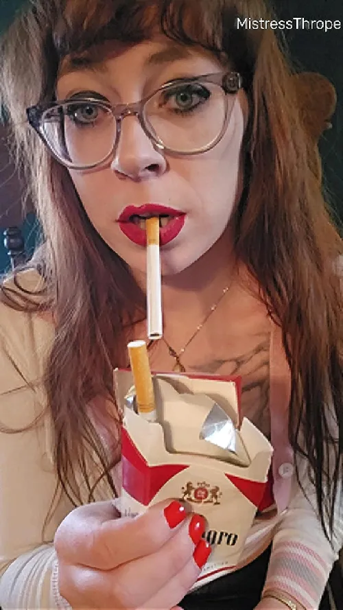 New glasses, but same smokey red lips